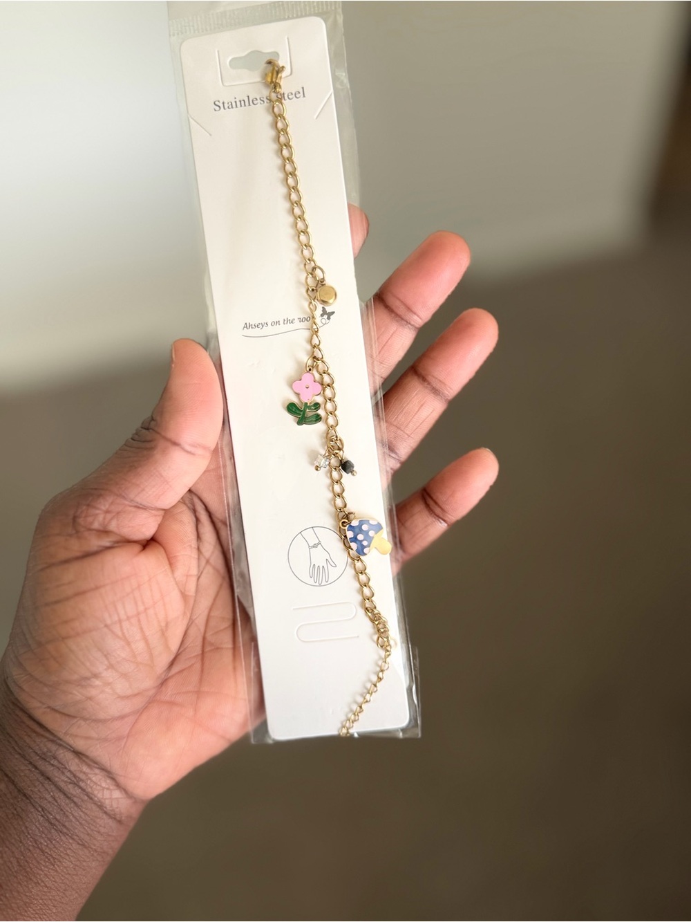 Gold Charm Bracelet with Pink Flower and Blue Mushroom Charms